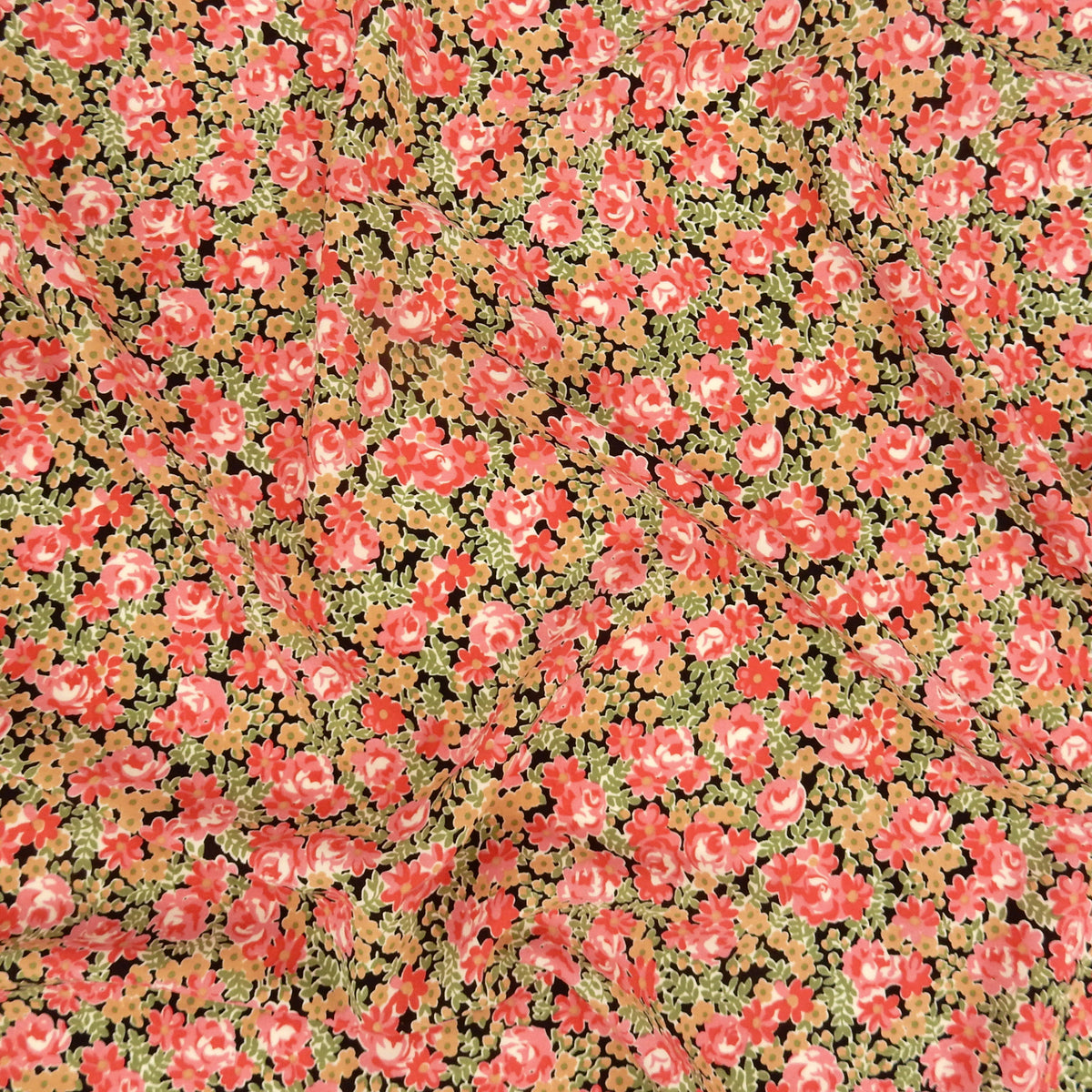 Premium 100% Rayon Challis Fabric.  Rose & Sage Millefleurs Floral on Black. lightweight & ultra soft. shown lightly gathered