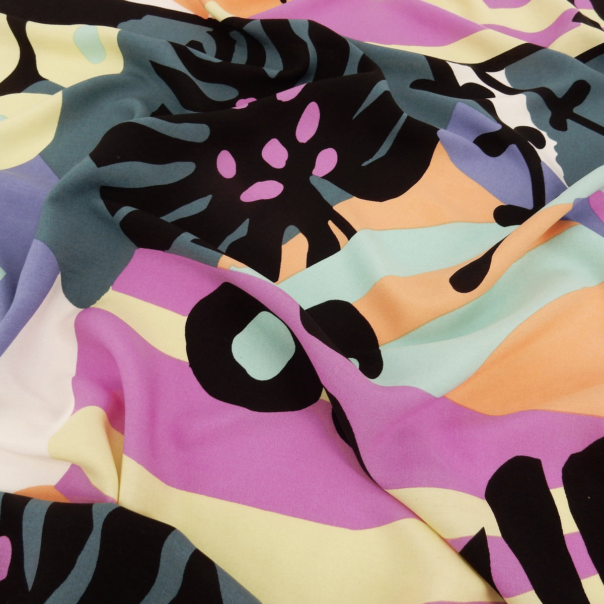 Premium 100% Rayon Challis Fabric. Retro Modern Abstract Graphic in Black, White & Fuschia. lightweight & ultra soft. shown lightly gathered