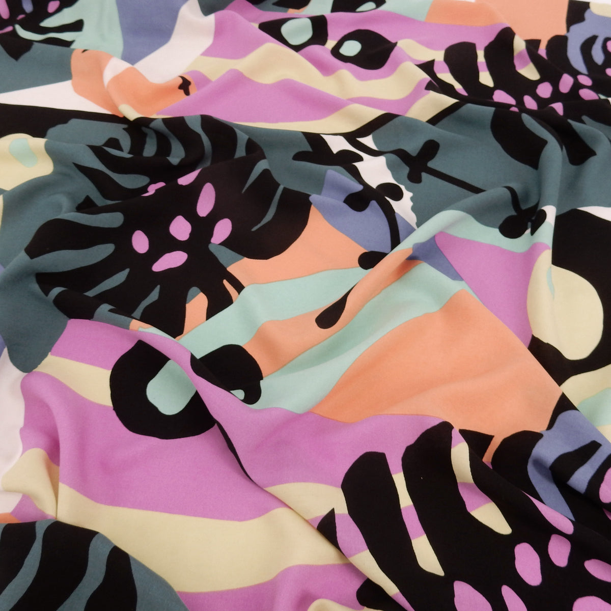 Premium 100% Rayon Challis Fabric. Retro Modern Abstract Graphic in Black, White & Fuschia. lightweight & ultra soft. shown lightly gathered