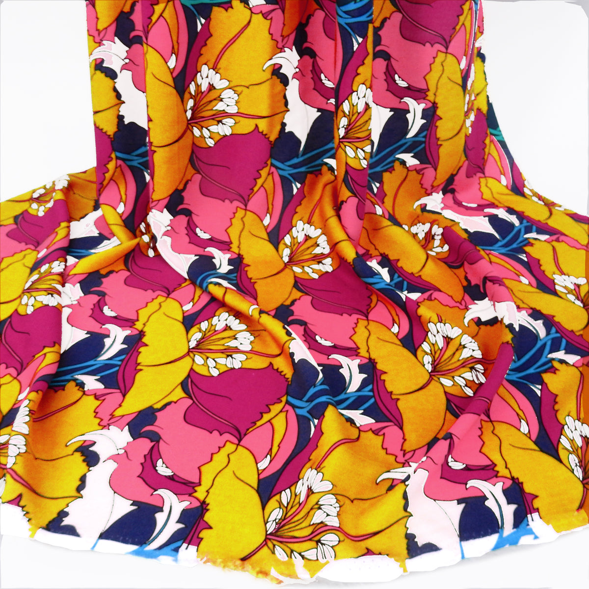 Premium 100% Rayon Challis Fabric. Dramatic Defined Floral in Magenta, Gold, warm coral & deep blue. lightweight & ultra soft. shown draped