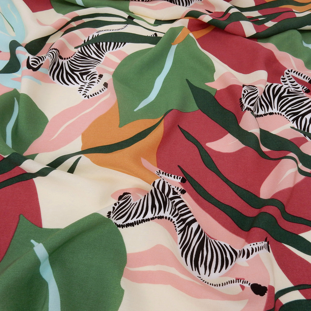 Premium 100% Rayon Challis Fabric.  Artistic Zebra Safari Print in Pale Wine, Hunter & Sage Green. lightweight & ultra soft. Shown lightly gathered