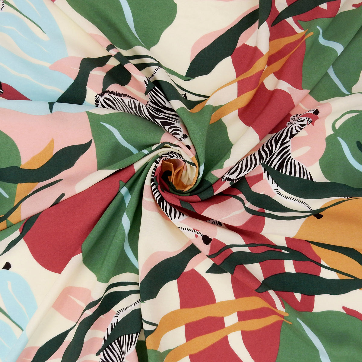 Premium 100% Rayon Challis Fabric.  Artistic Zebra Safari Print in Pale Wine, Hunter & Sage Green. lightweight & ultra soft. Shown swirled