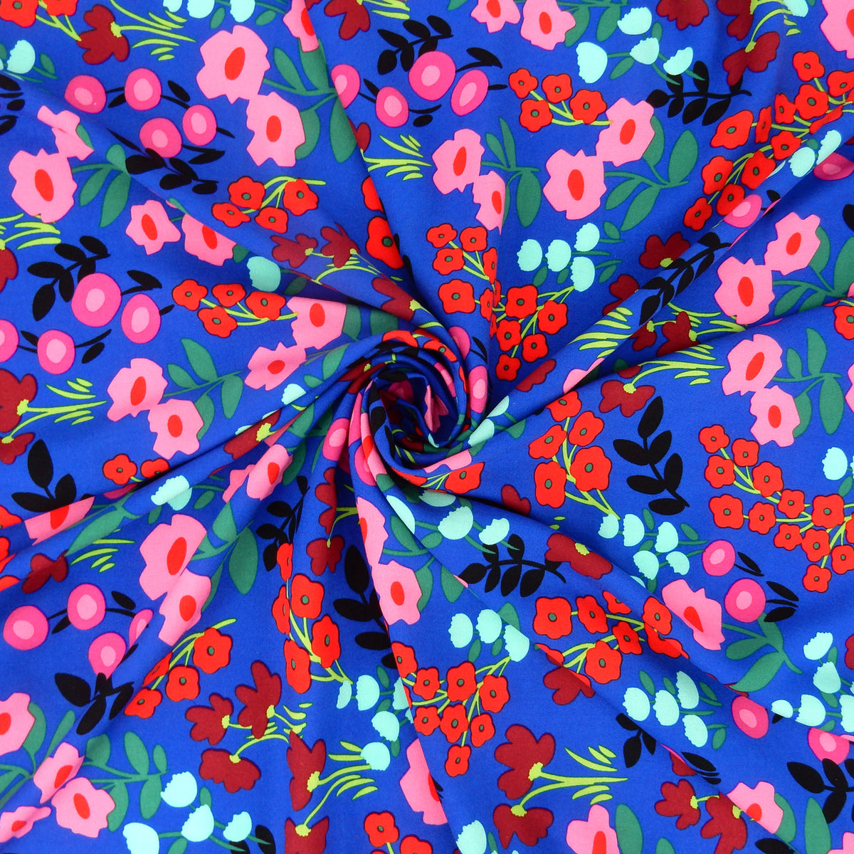 Premium 100% Rayon Challis Fabric. Bold Renaissance Floral on Sapphire Blue. lightweight & ultra soft. shown swirled