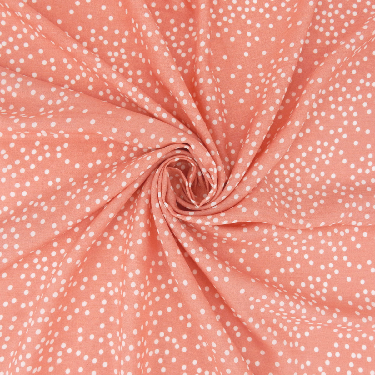 Premium 100% Rayon Challis Fabric. Artfully Spaced Polka Dot on Soft Coral. lightweight & ultra soft. shown swirled