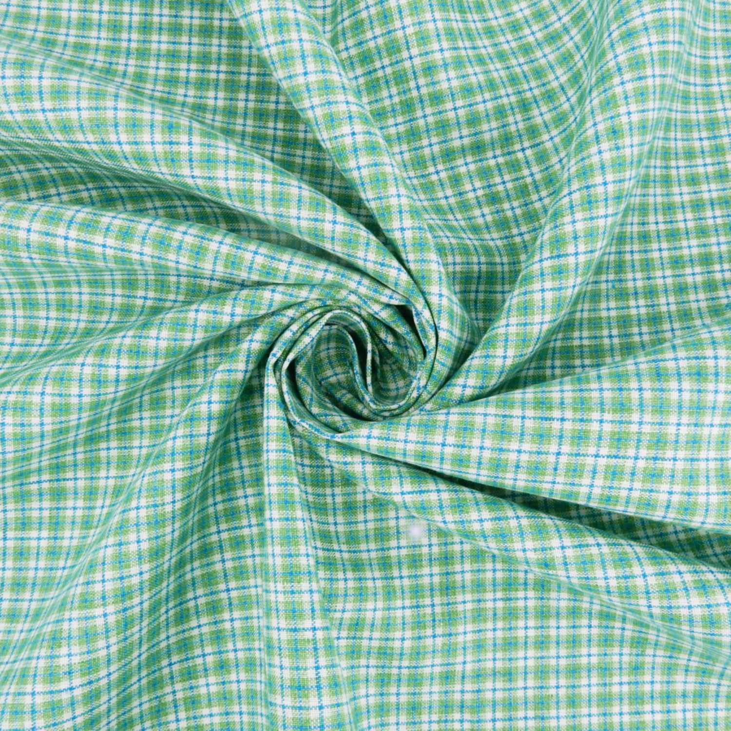Premium 100% European Linen Yarn Dyed Plaid Fabric. light green color. shown swirled