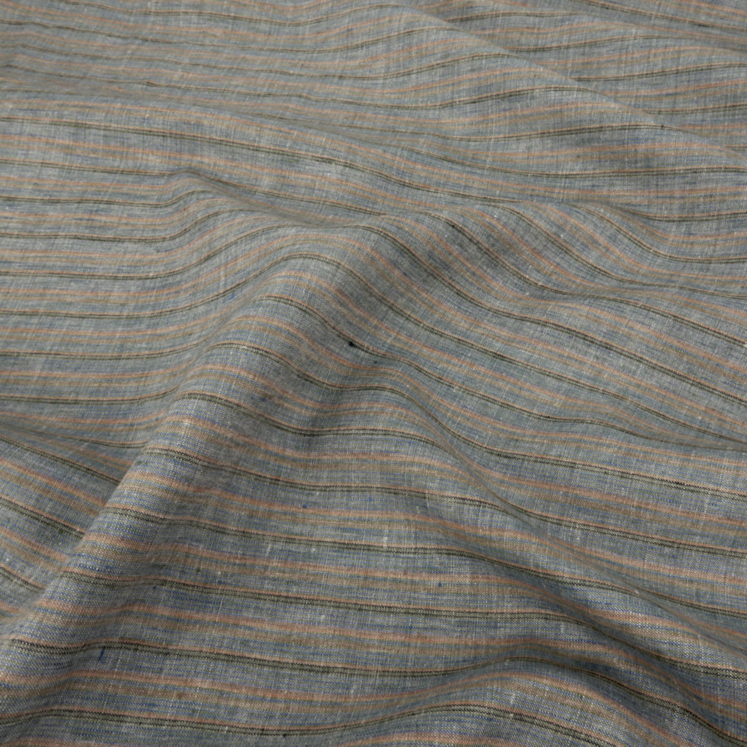 Premium 100% European Linen Yarn Dyed Muted Stripe Fabric. muted blue, brown & beige stripe. shown lightly gathered