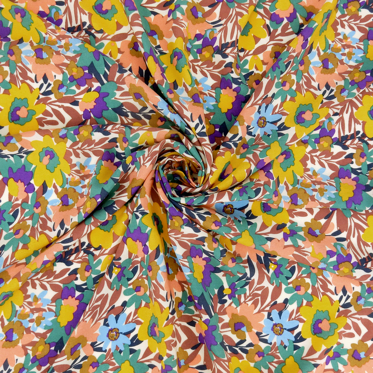 Premium 100% Rayon Challis Fabric. Vibrant Botanical on Creamy White. lightweight & ultra soft. shown swirled