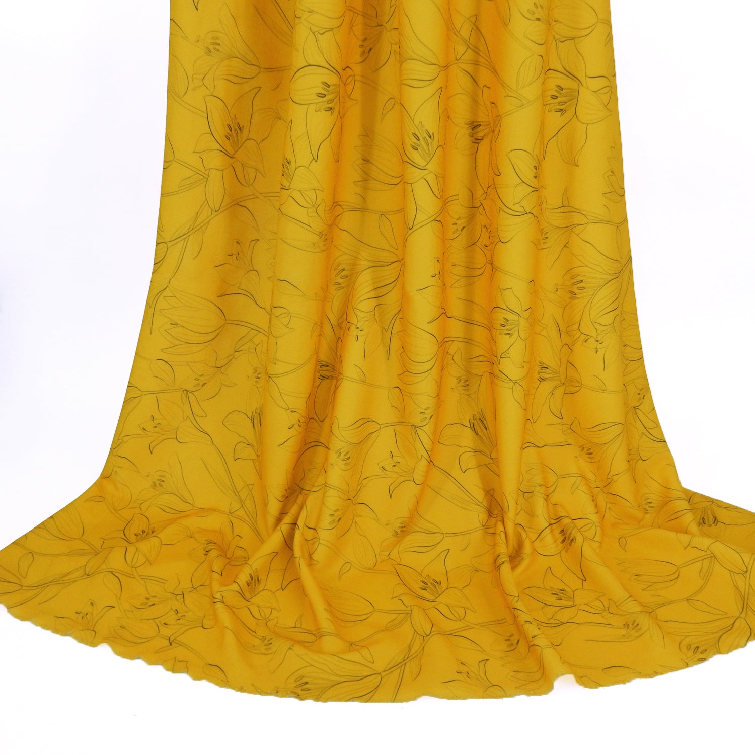 Premium Pebble Crepe Double Stretch Knit Fabric.  Lily floral design on rich gold 2-way stretch polyester crepe. shown draped