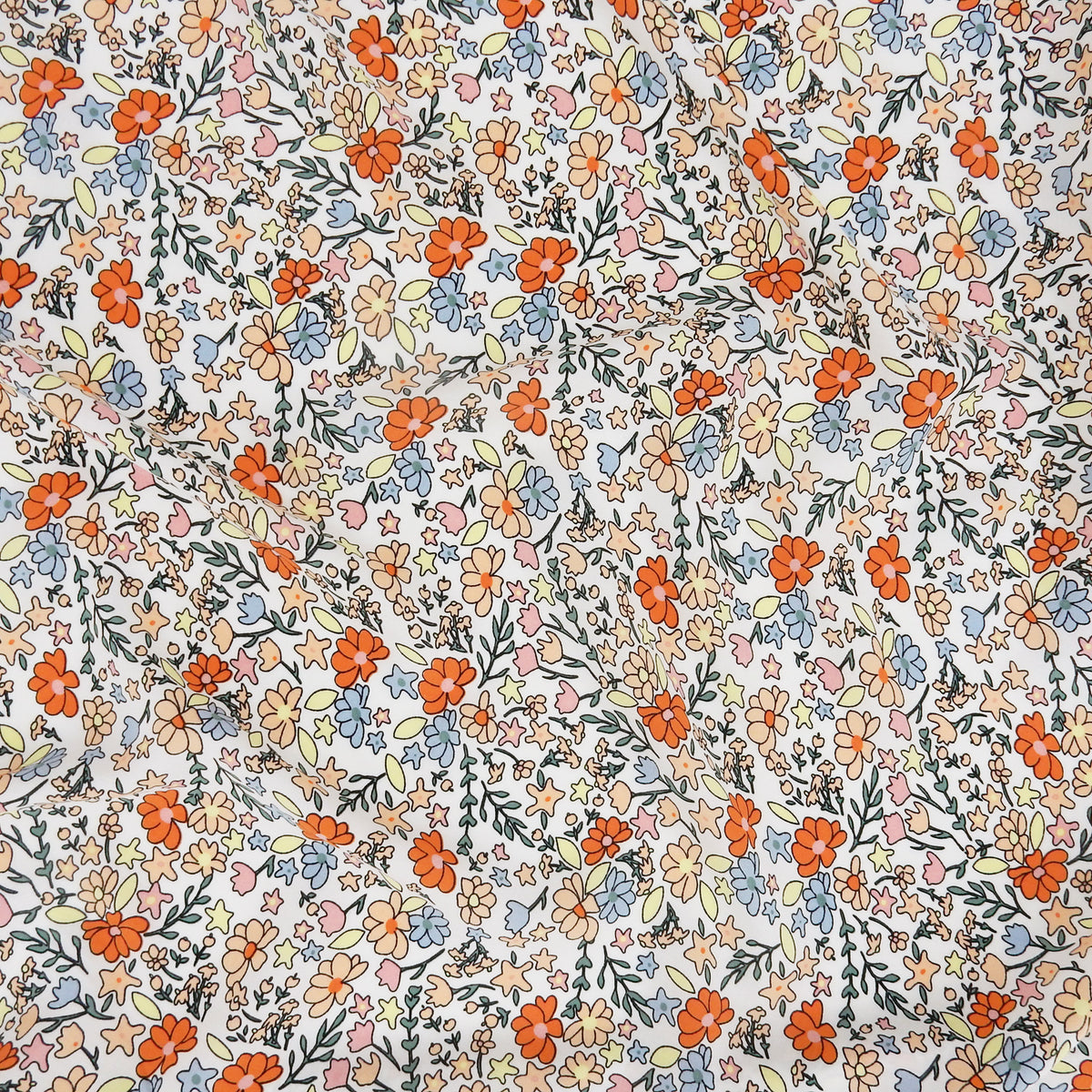 Premium 100% Rayon Challis Fabric. Playful Millefleurs Floral in Burnt Orange, Peach, Dusty Blue, Soft Yellow & Pink. lightweight & ultra soft. shown flat