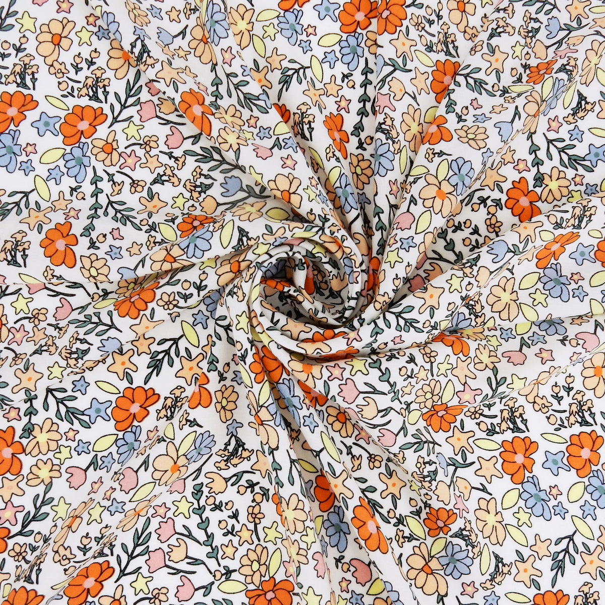 Premium 100% Rayon Challis Fabric. Playful Millefleurs Floral in Burnt Orange, Peach, Dusty Blue, Soft Yellow & Pink. lightweight & ultra soft. shown swirled