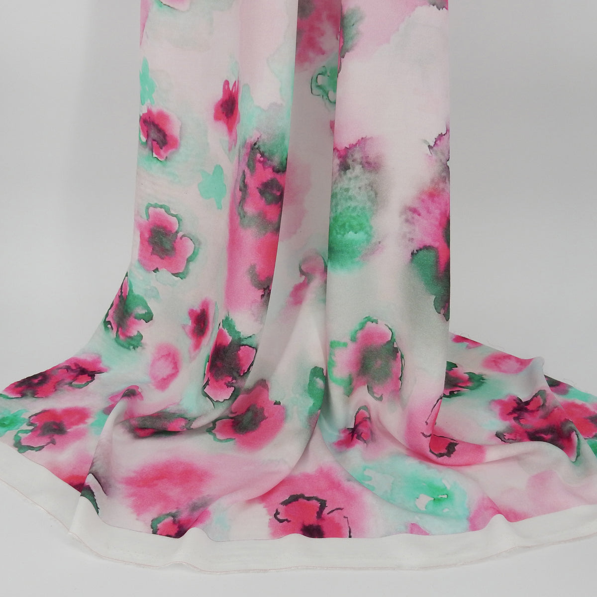 Premium 100% Rayon Challis Fabric. Watercolor floral Print in Fuchsia and Green. lightweight & ultra soft. shown draped