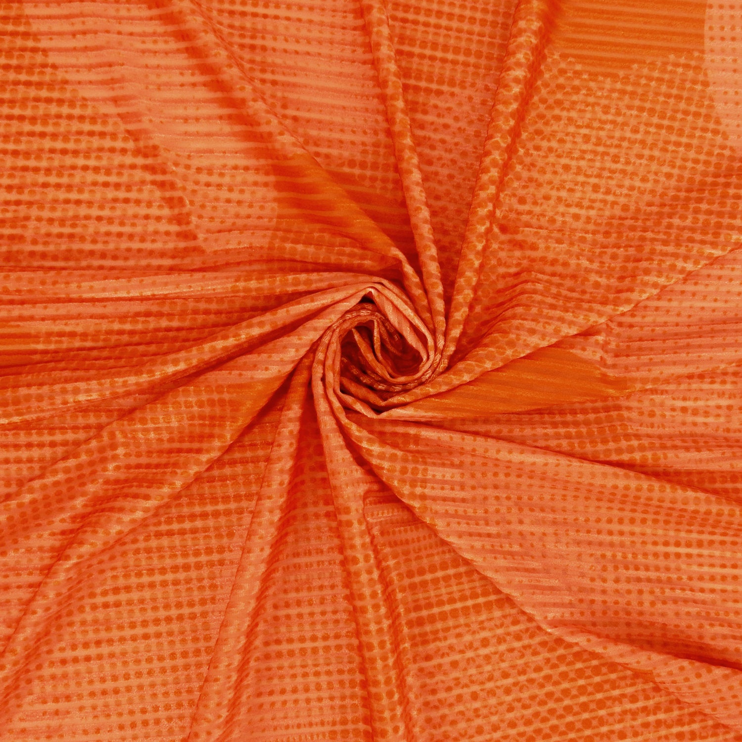 Premium Printed Burnout Stretch Velvet Fabric. Luxury spanish ombre' spice & orange design on polyester spandex horizontal stripe velvet burnout. Shown swirled